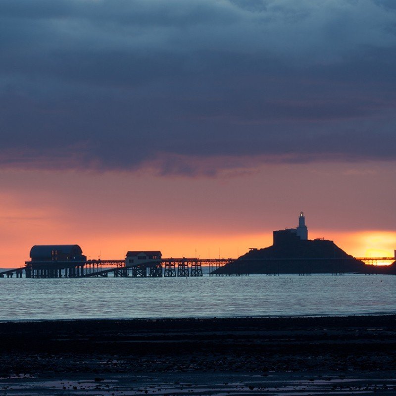 Mumbles Pier at sunset - Swansea Bay Moments