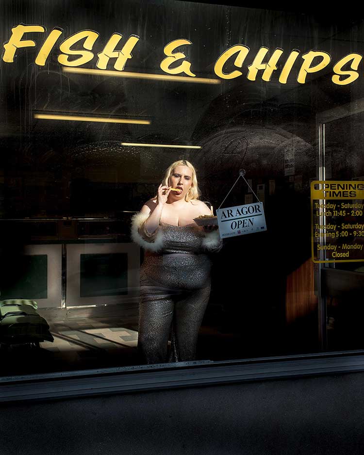 Megan Winstone Woman in chip shop window